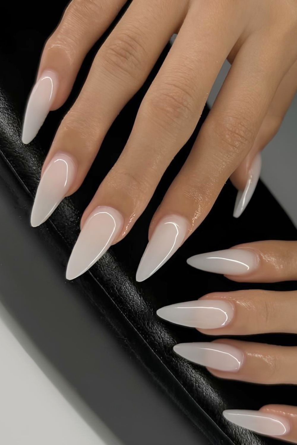 Milky white long stiletto mani