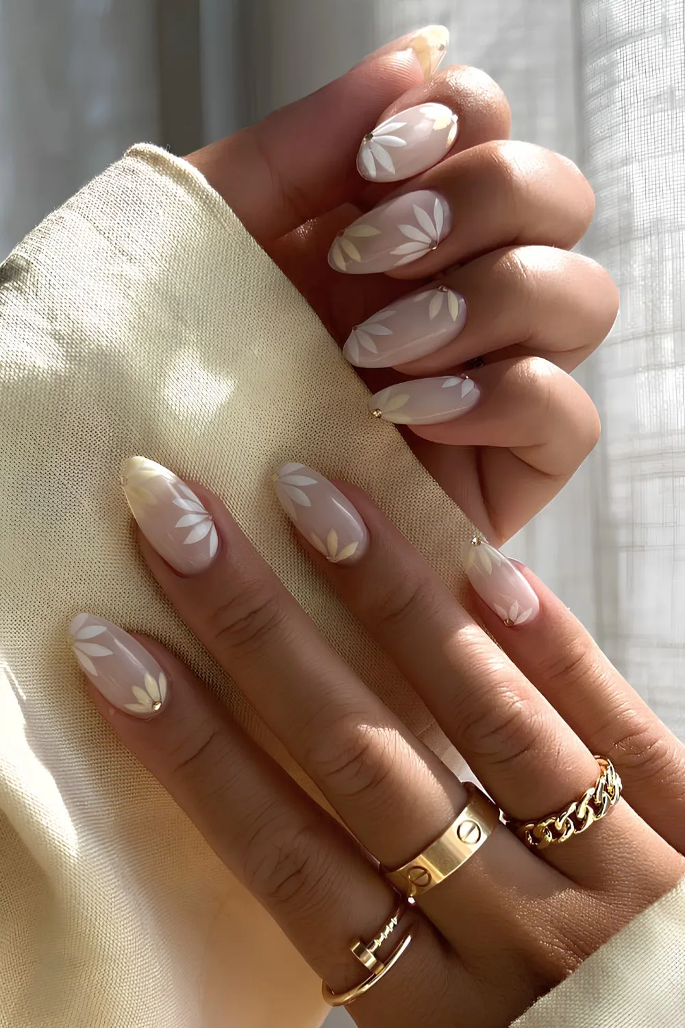 Milky white nails with white petal art