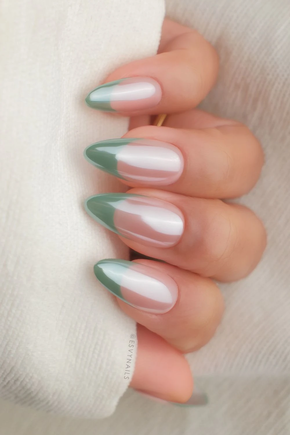 Muted green French mani with chrome overlay