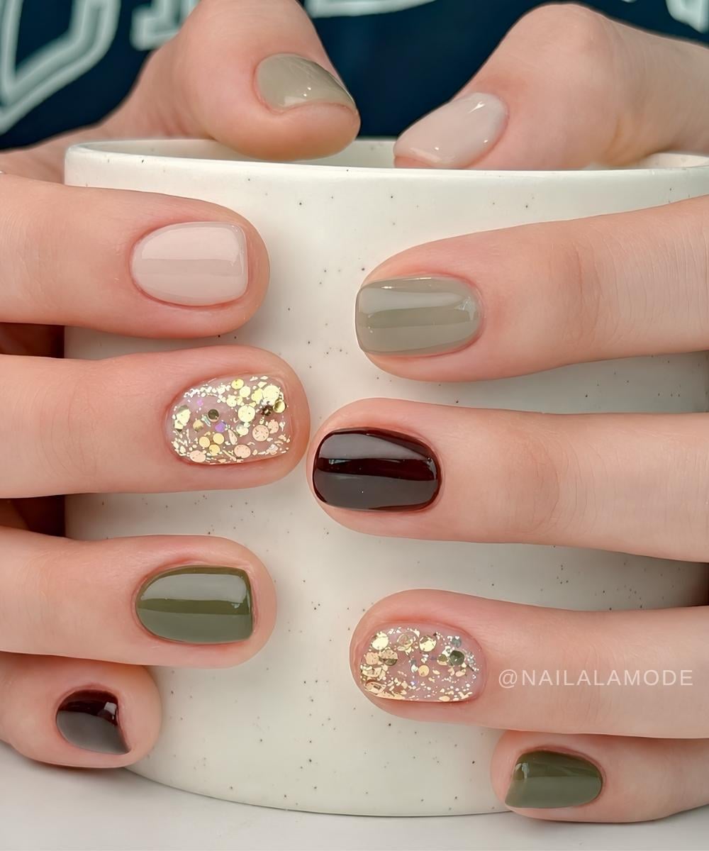 Olive and brown skittle nails with glitter