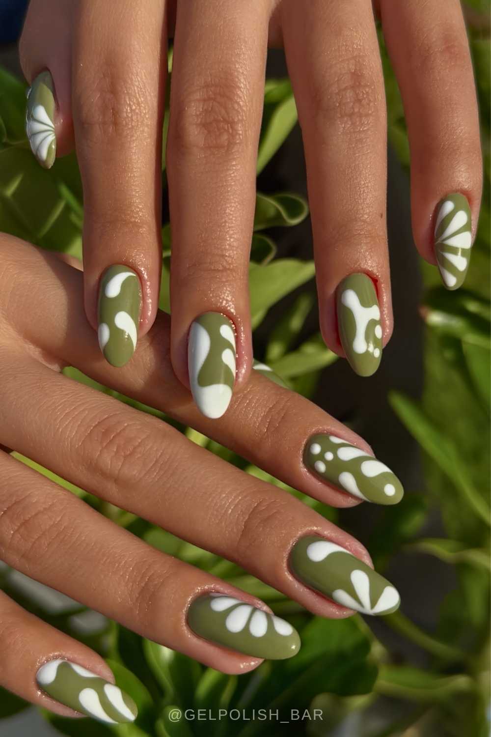 Olive green nails with abstract white art