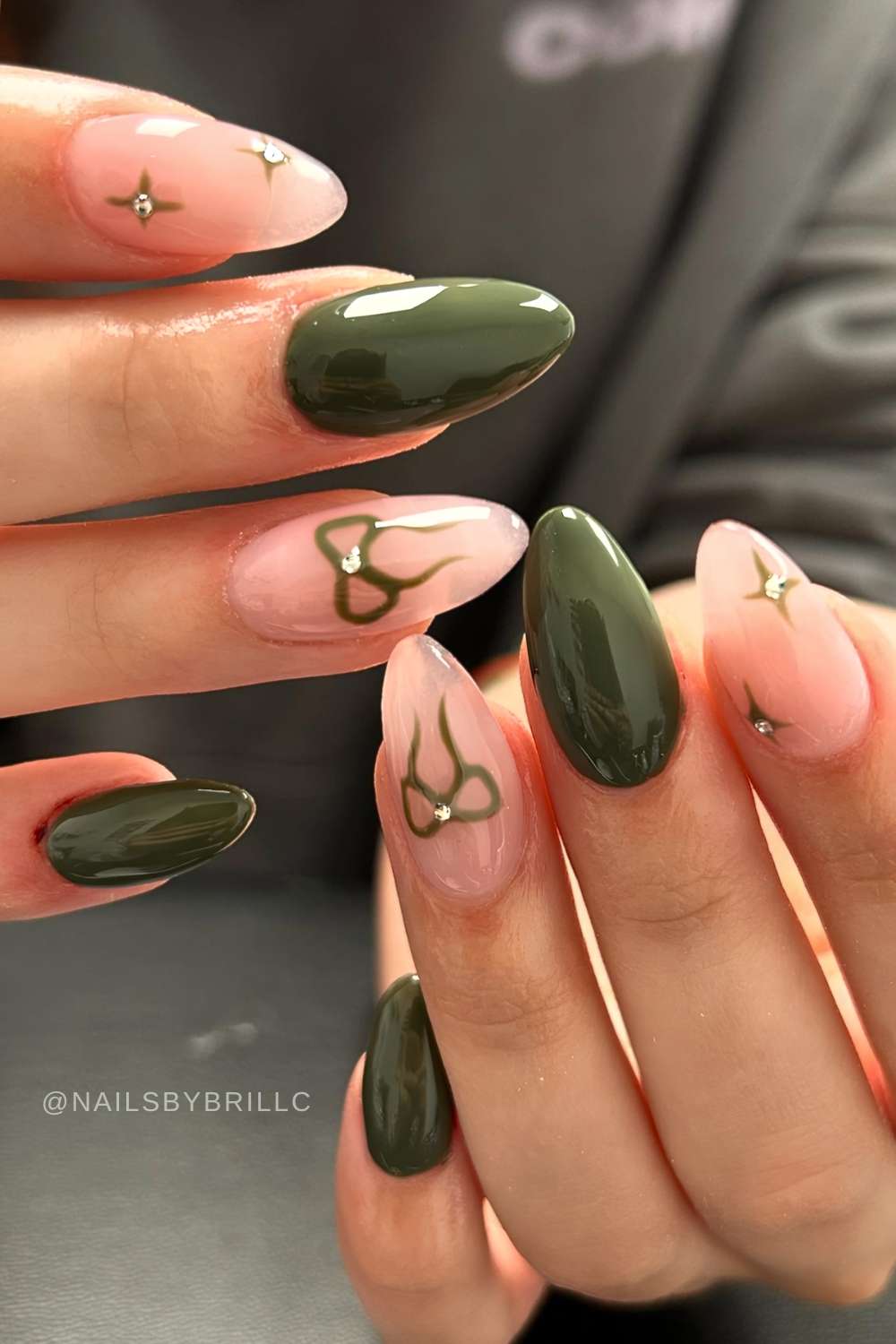Olive green nails with gems and bows