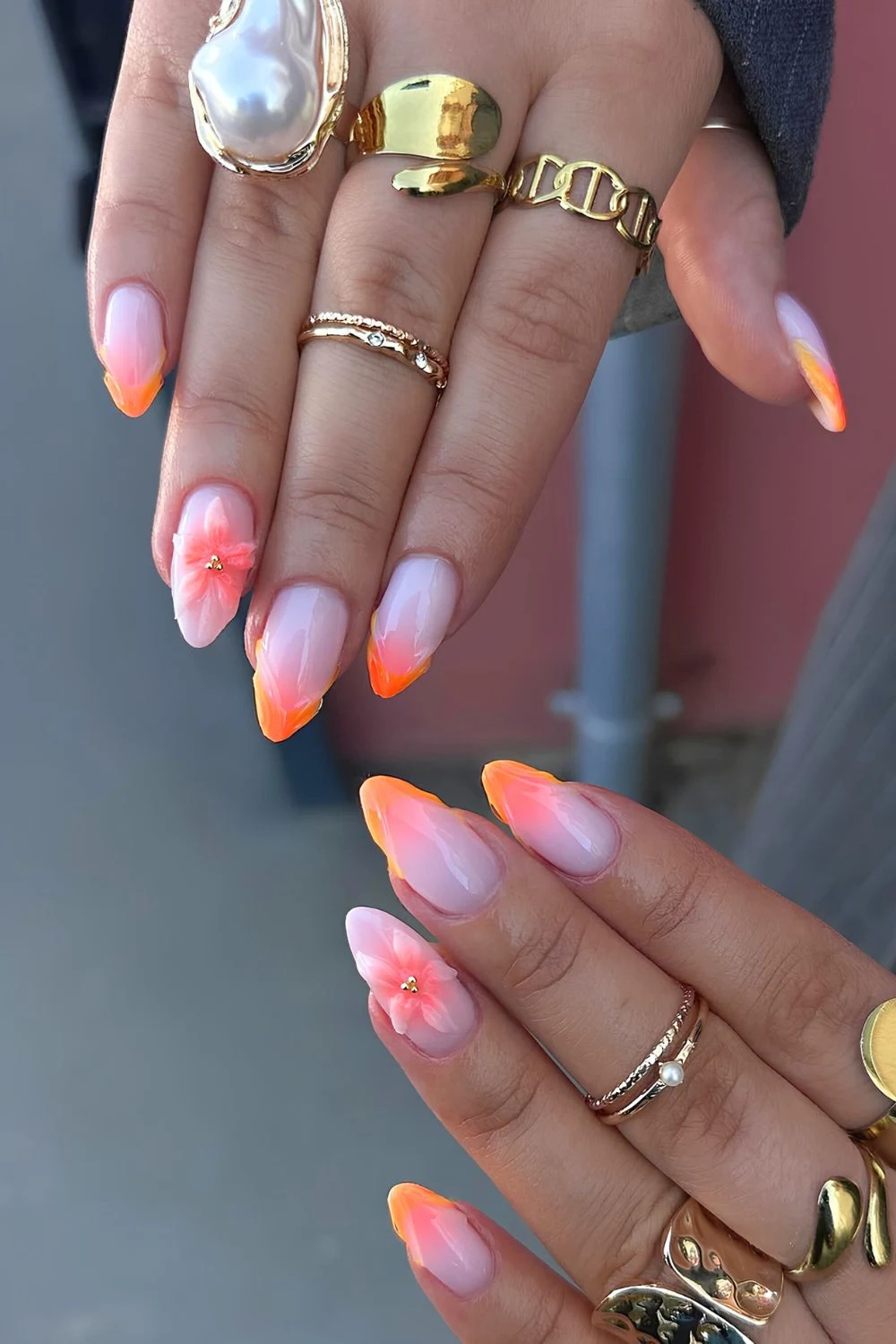 Orange 3d French mani with sculpted flowers