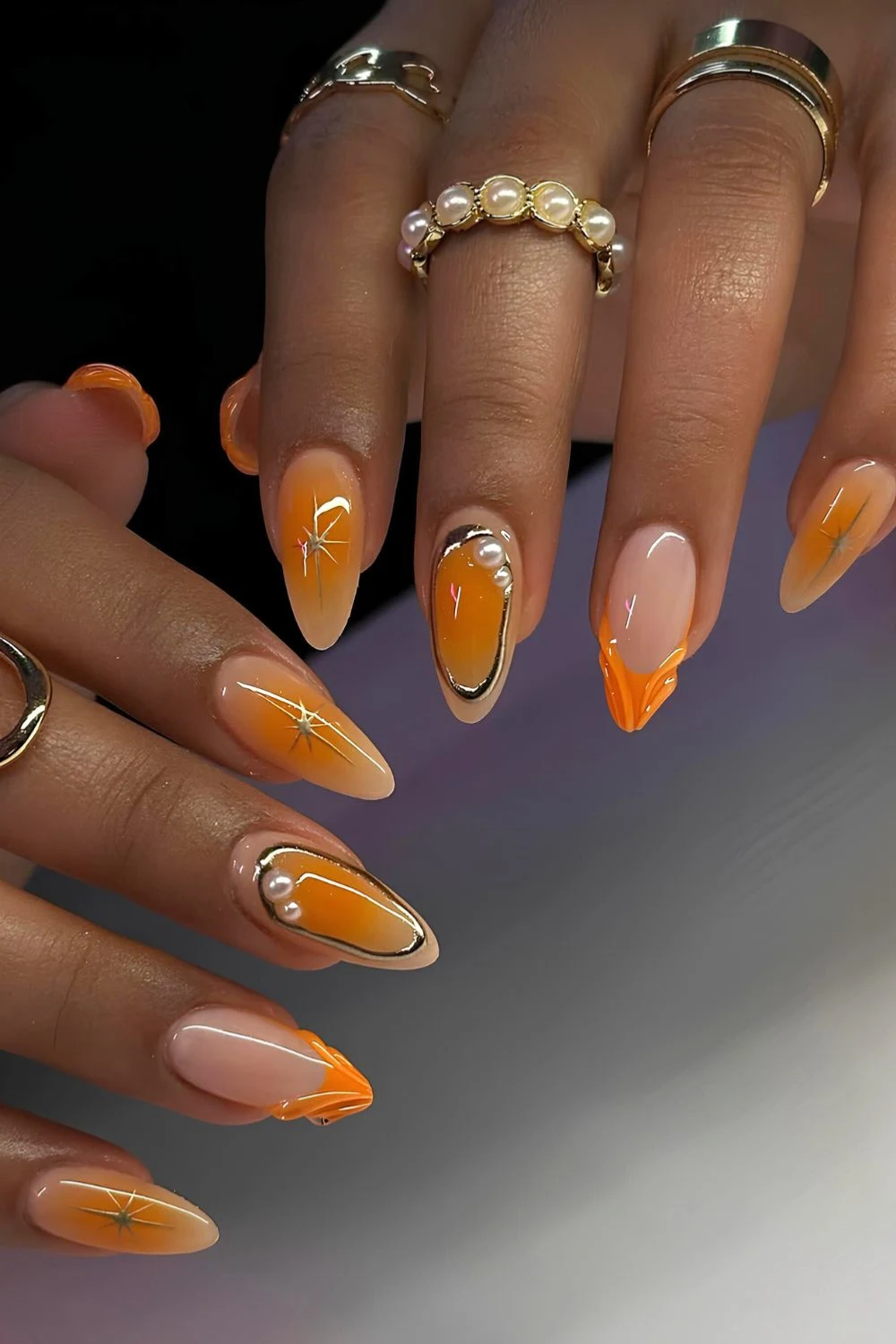 Orange mani with mix and match design