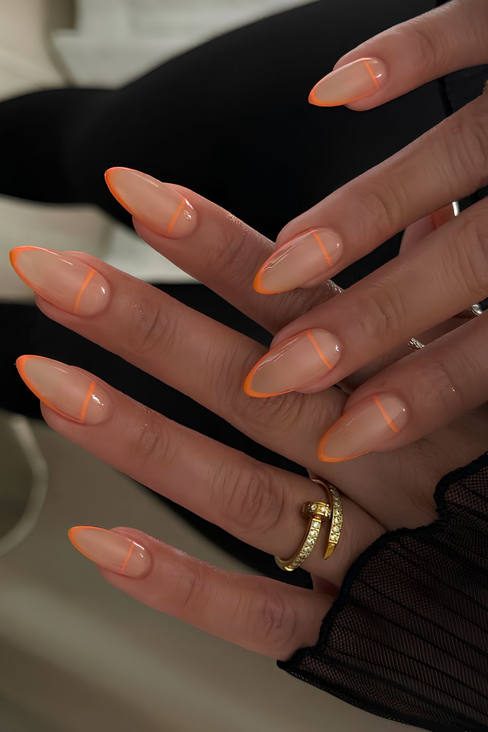 Orange micro French tip manicure