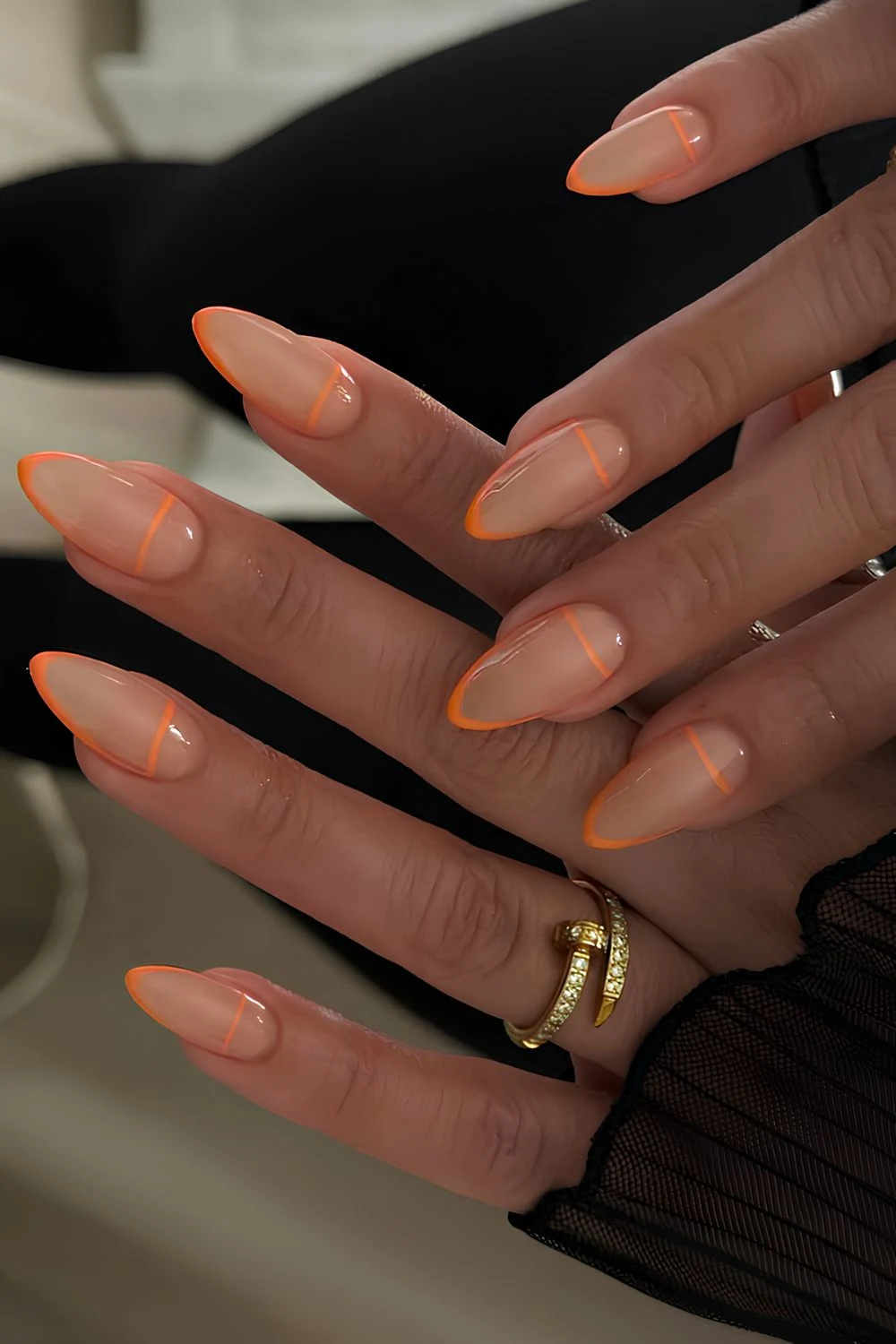 Orange micro French tip manicure