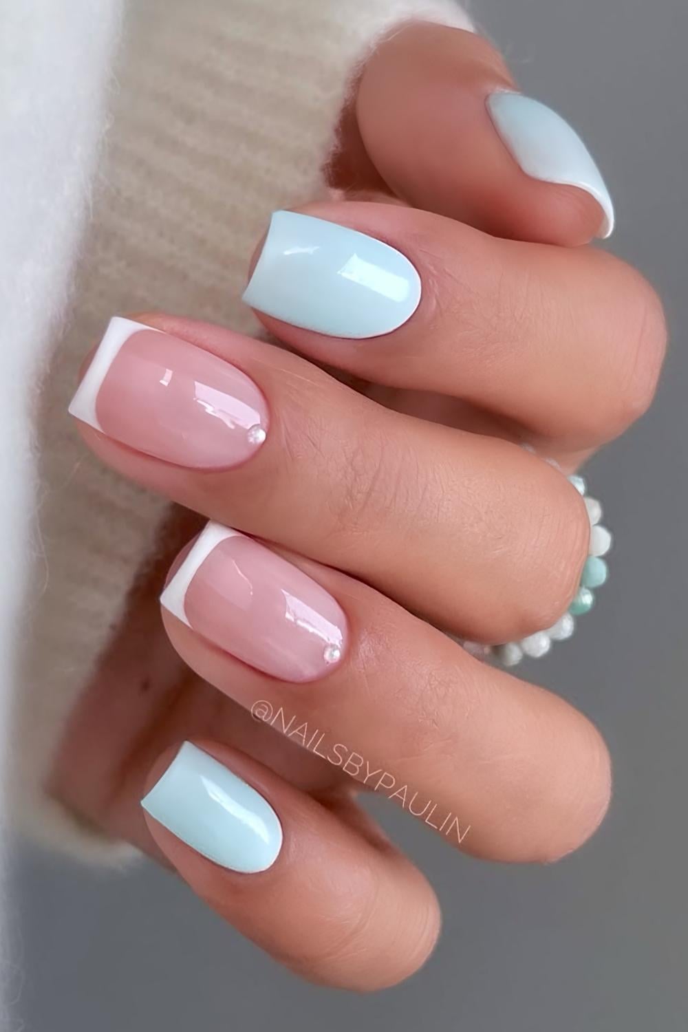 Pale blue mani with accent French tips and pearls