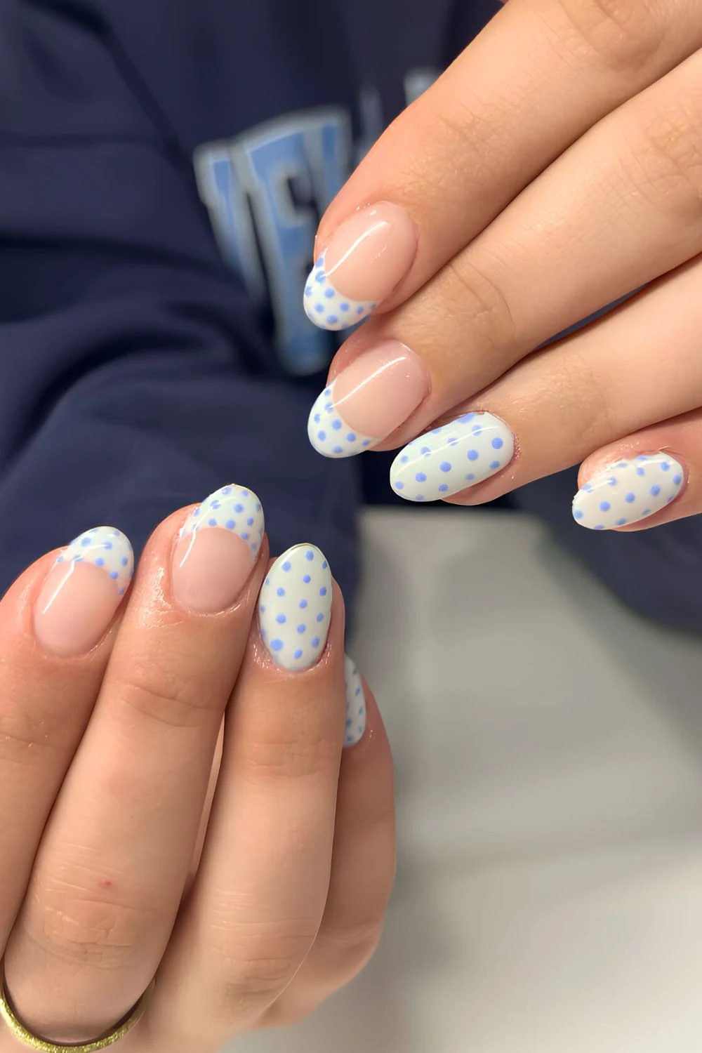 Pale blue nails with tiny dots