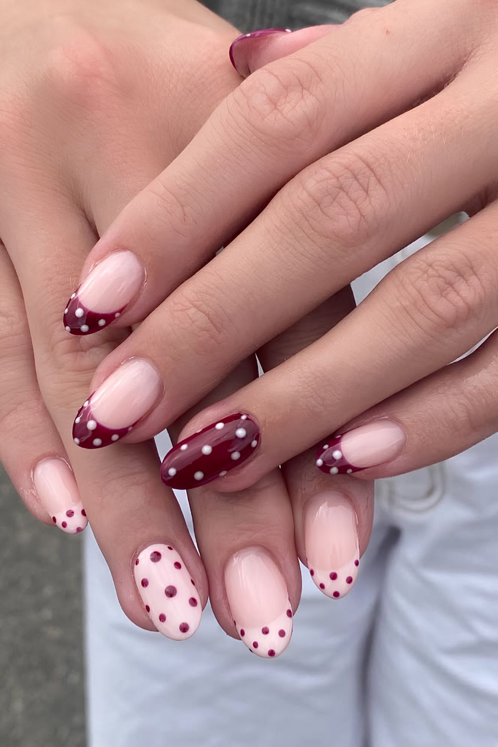 Pink and burgundy nails with micro dots