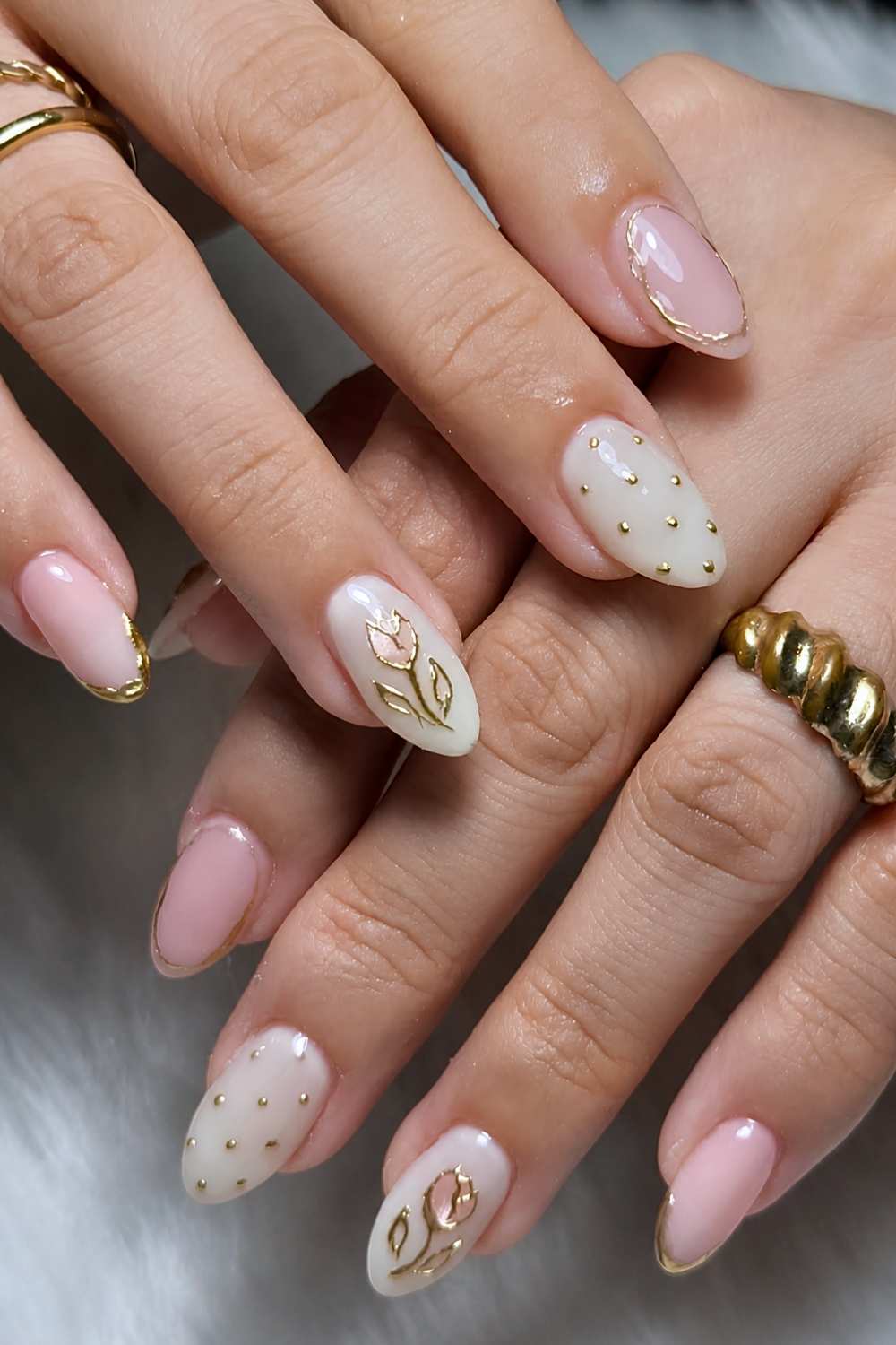Pink and white mani with gold tulips and dots