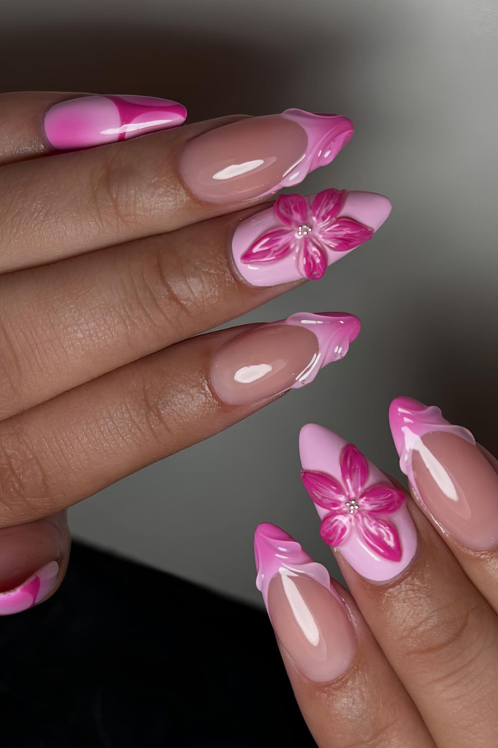 Pink nails with sculpted tips and flowers