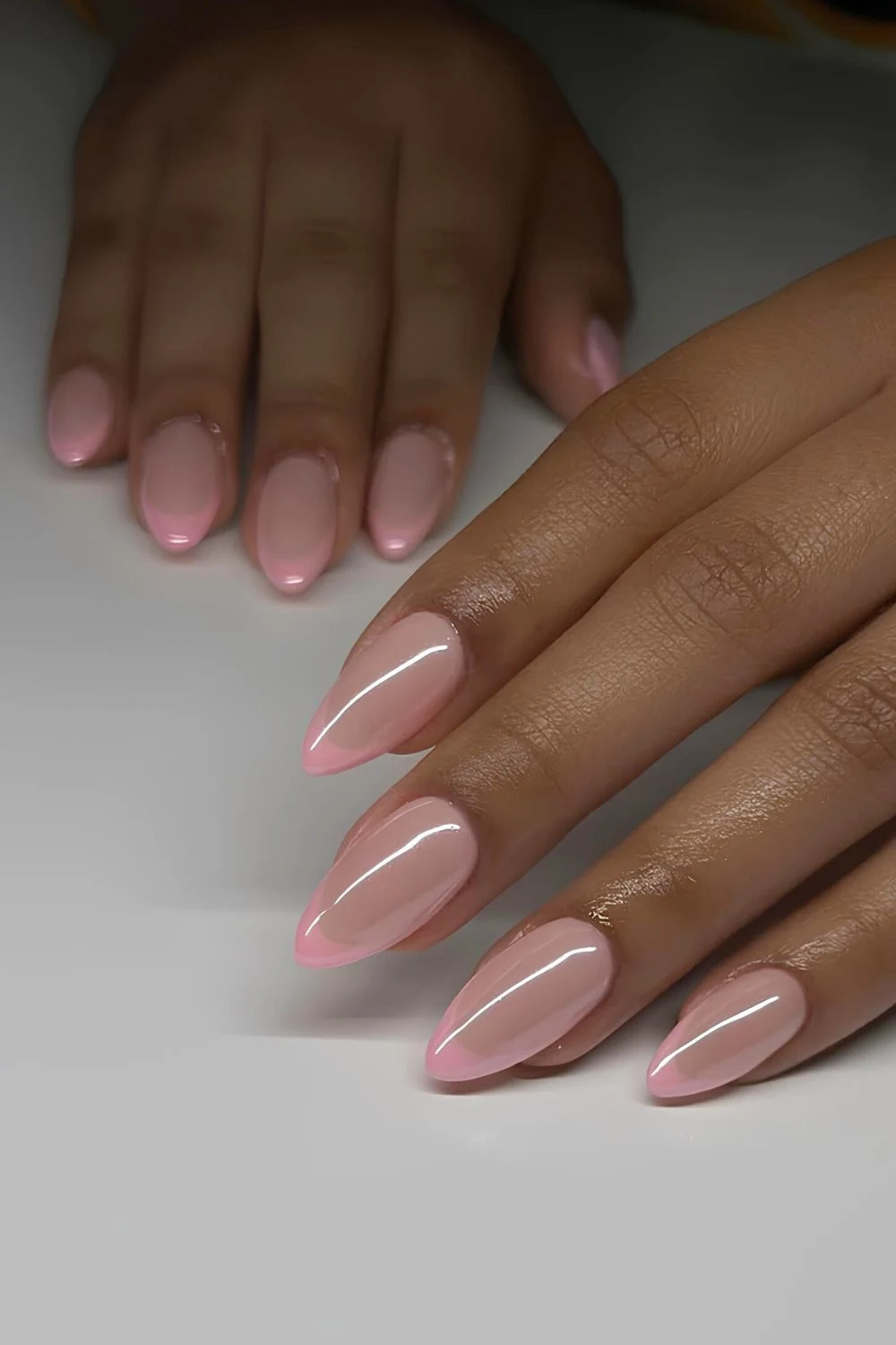 Pink on pink French mani with chrome overlay