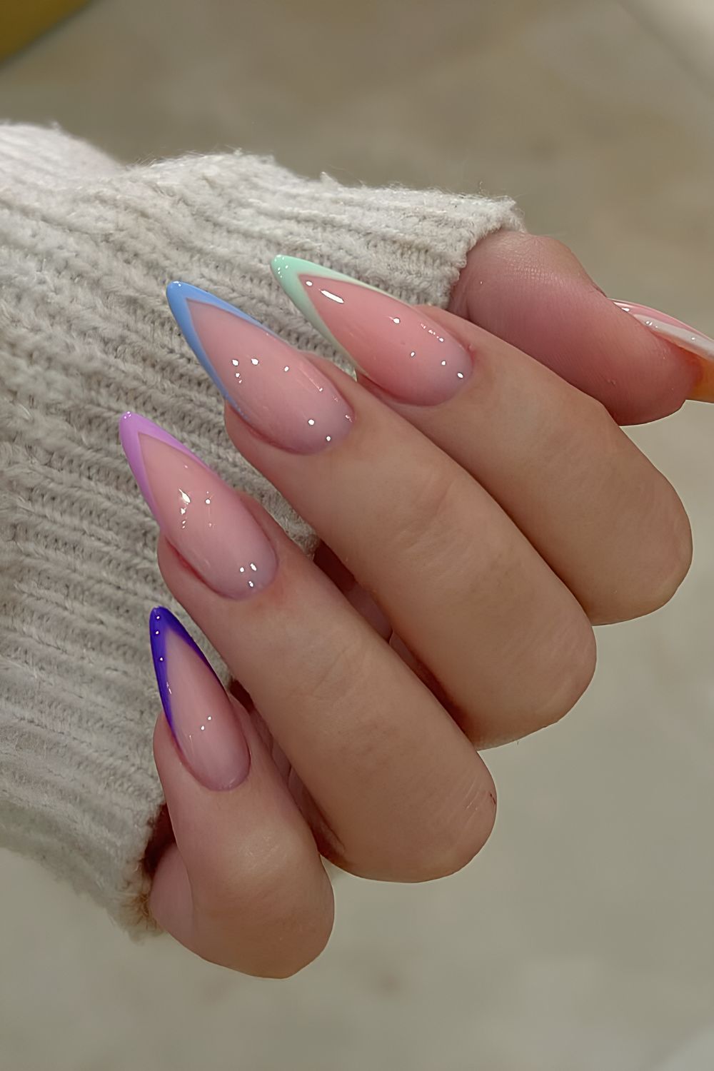 Pointed French mani in pastel colors