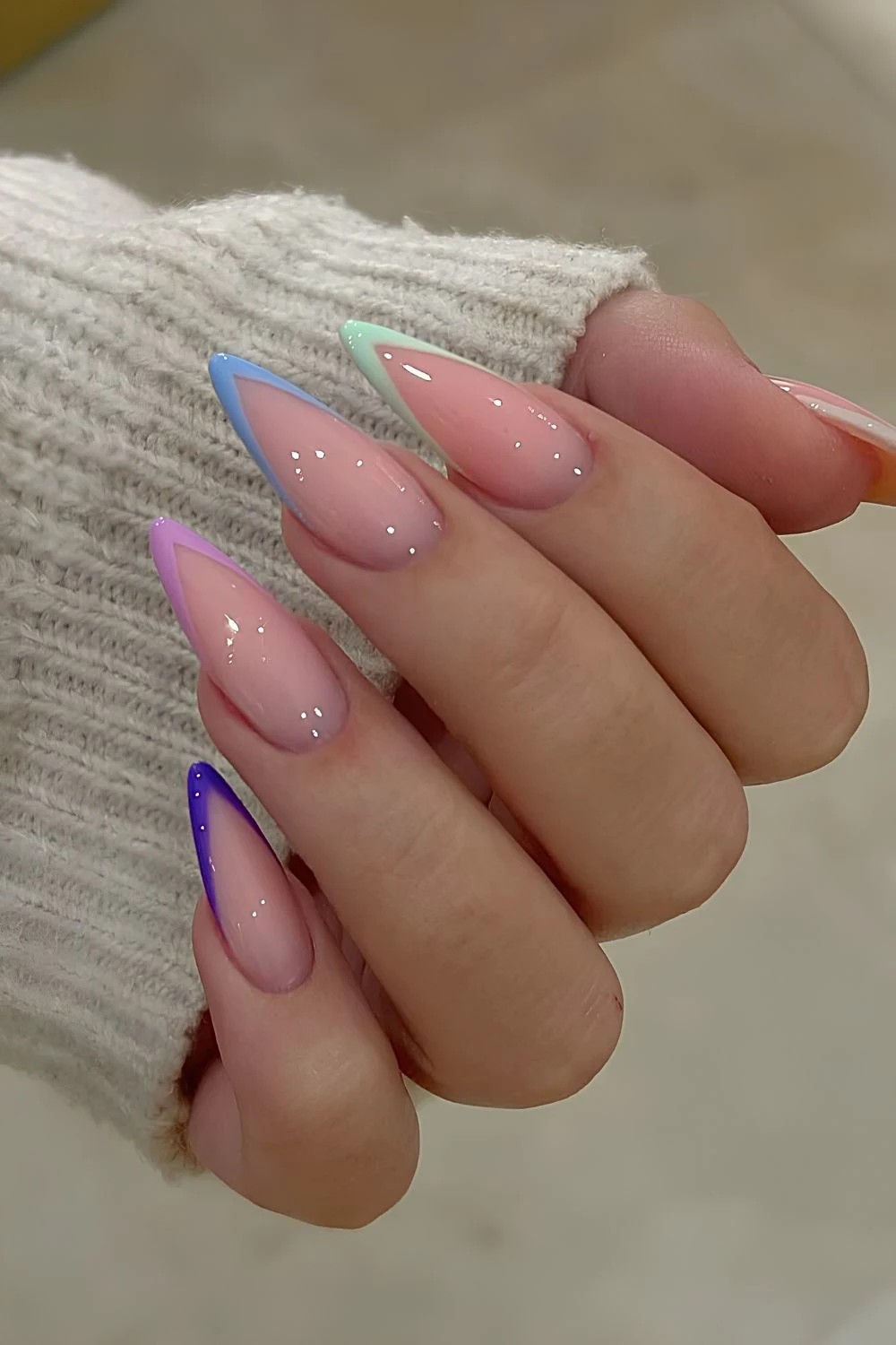 Pointed French mani in pastel colors