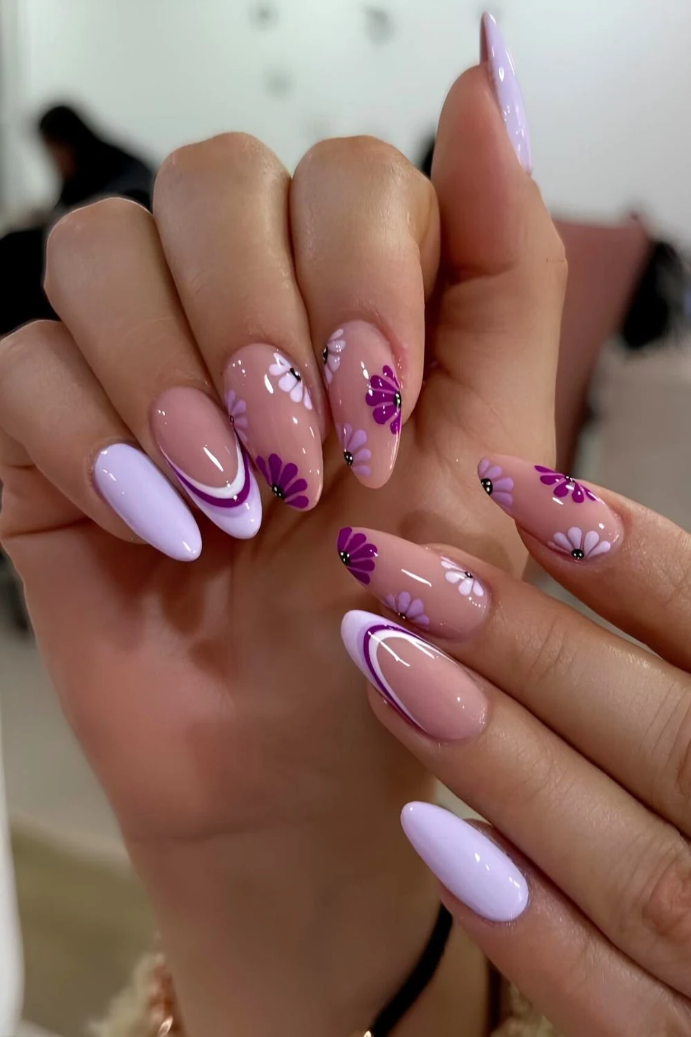 Purple nails with flowers