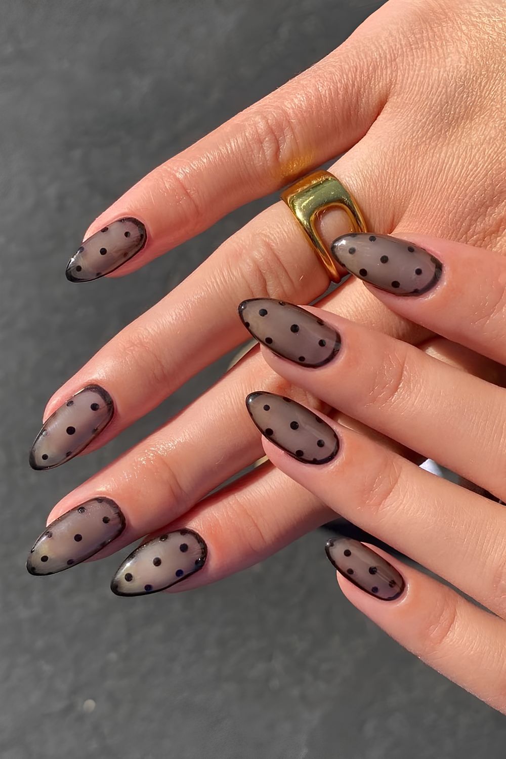 Sheer black nails with micro dots