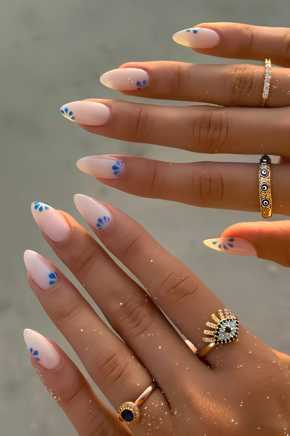Sheer white mani with blue flowers