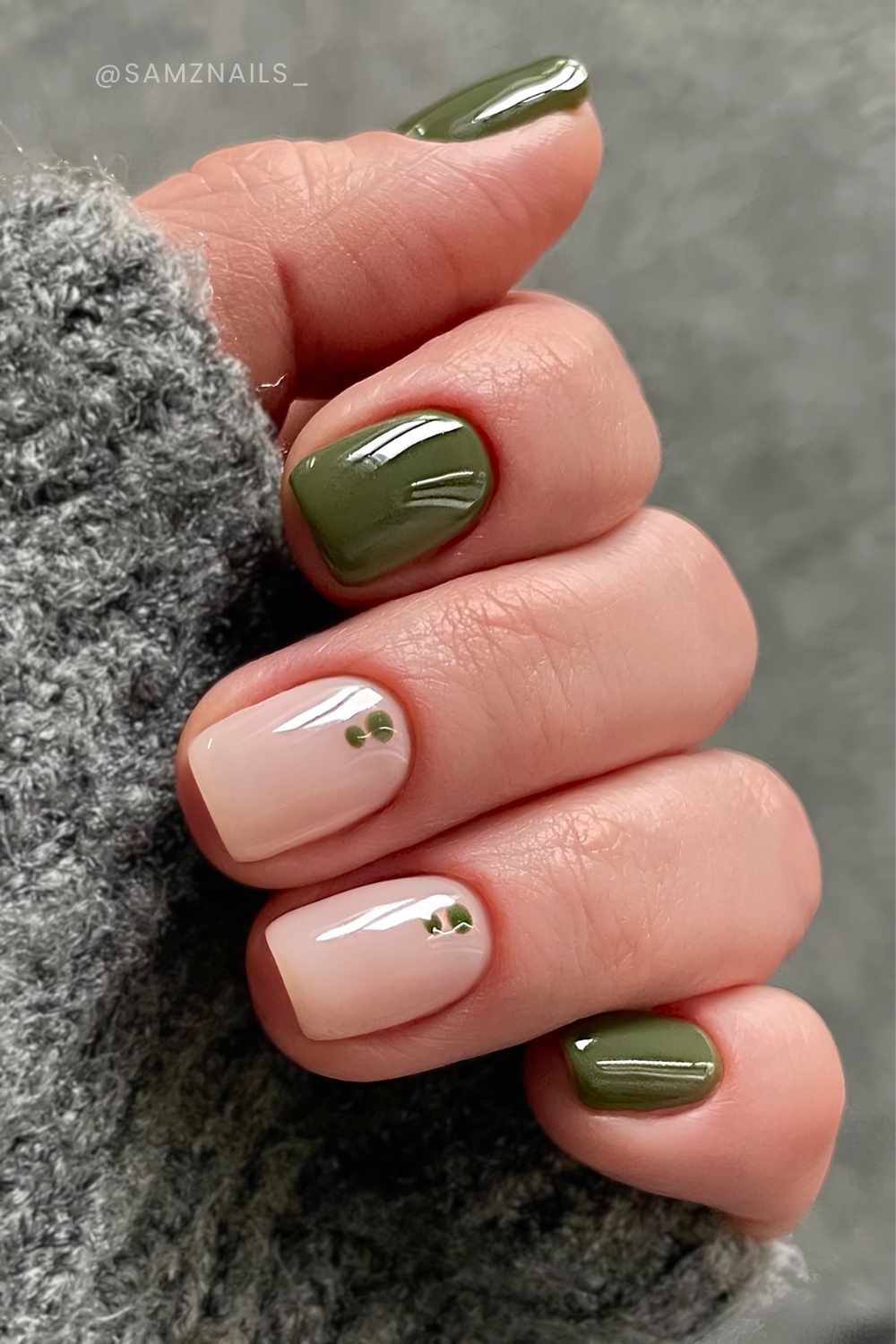Short olive nails with minimalist dot art