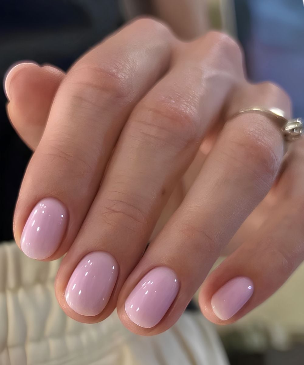 Short round milky pink nails