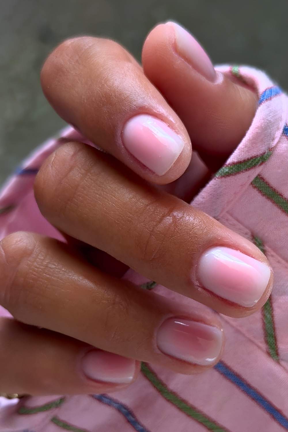 Short white mani with pink aura shading