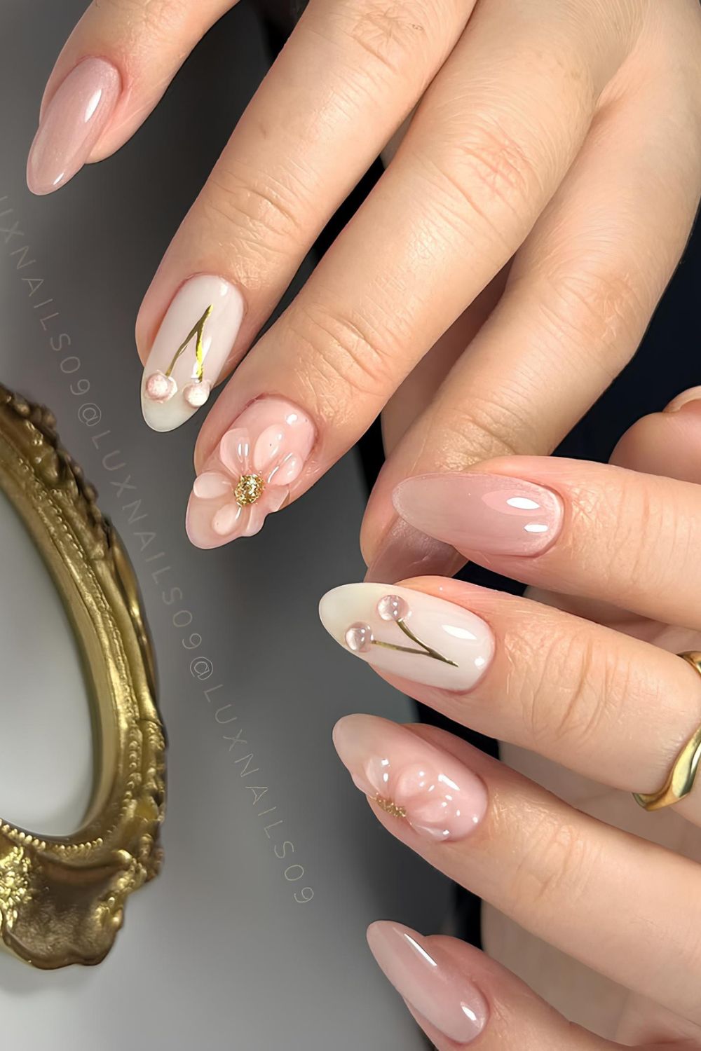 Soft pink and milky nails with glass effect and sculpted florals and cherries