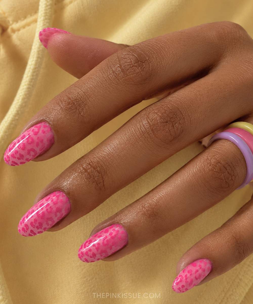 Vibrant pink cheetah print manicure