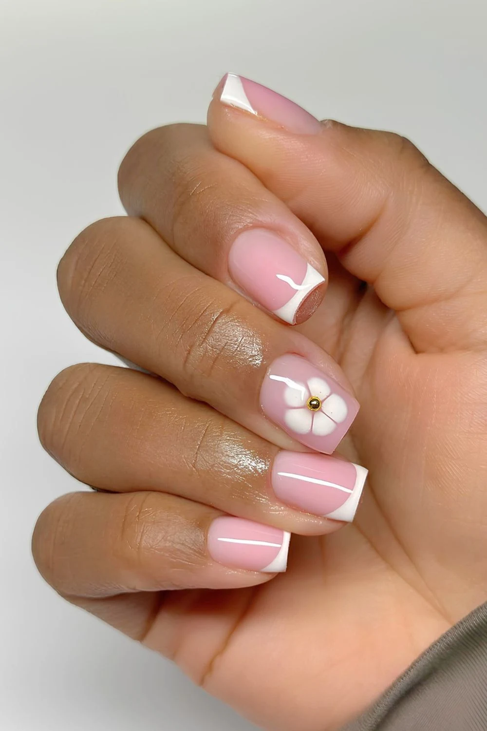 White French Mani with blooming flower accent