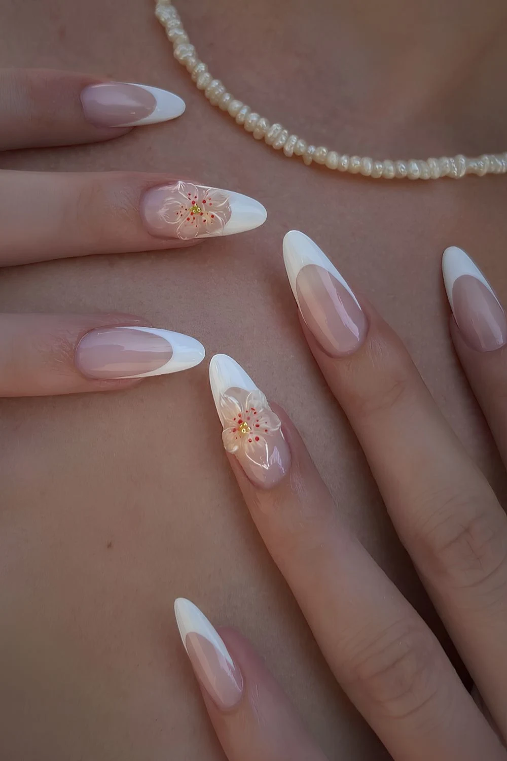 White French manicure with 3d floral accents