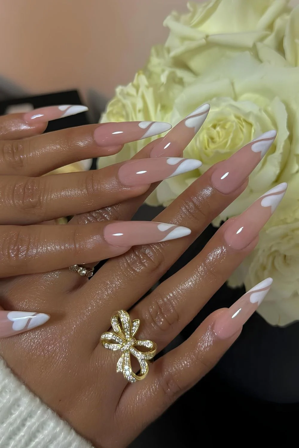 White heart-shaped French nails with beige base