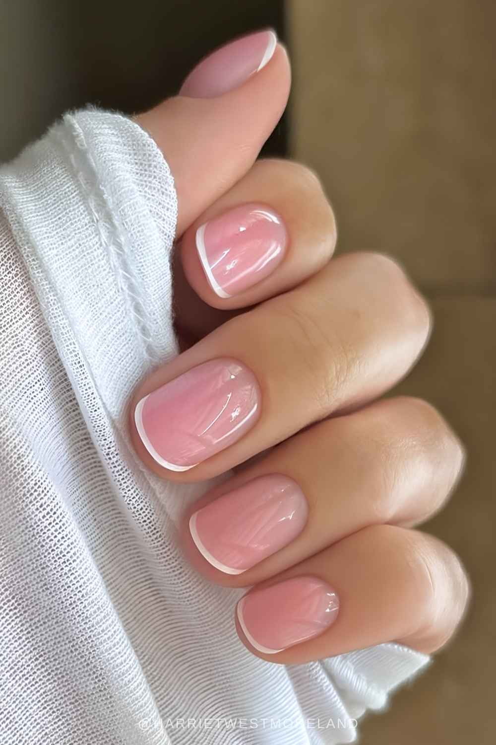 White micro French mani on pink base