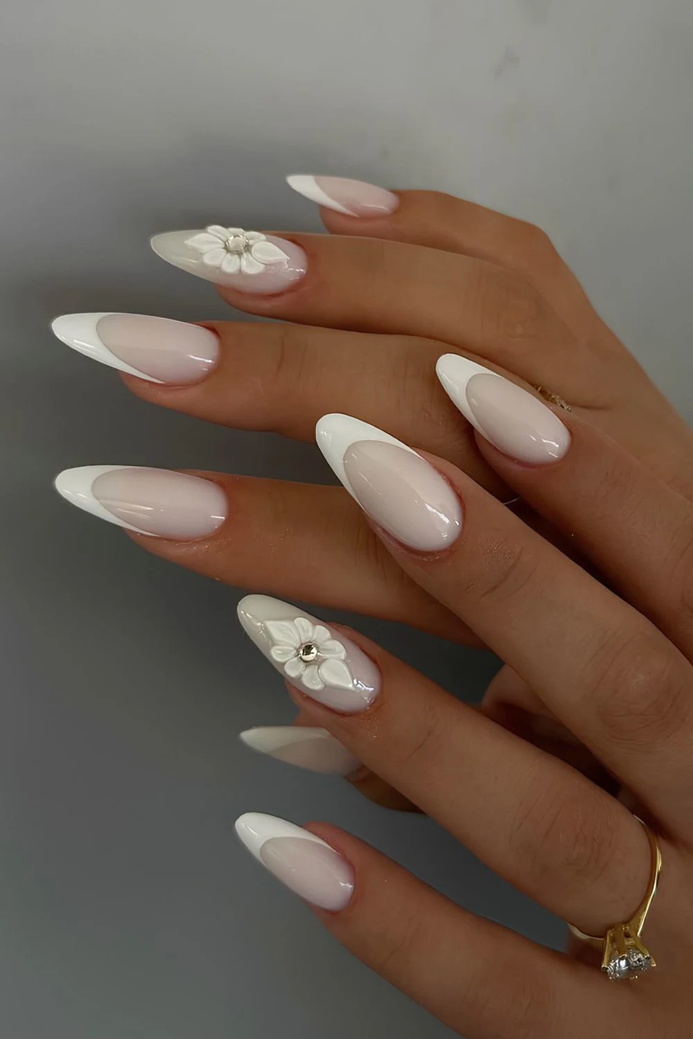 White on white French mani with 3d floral accent