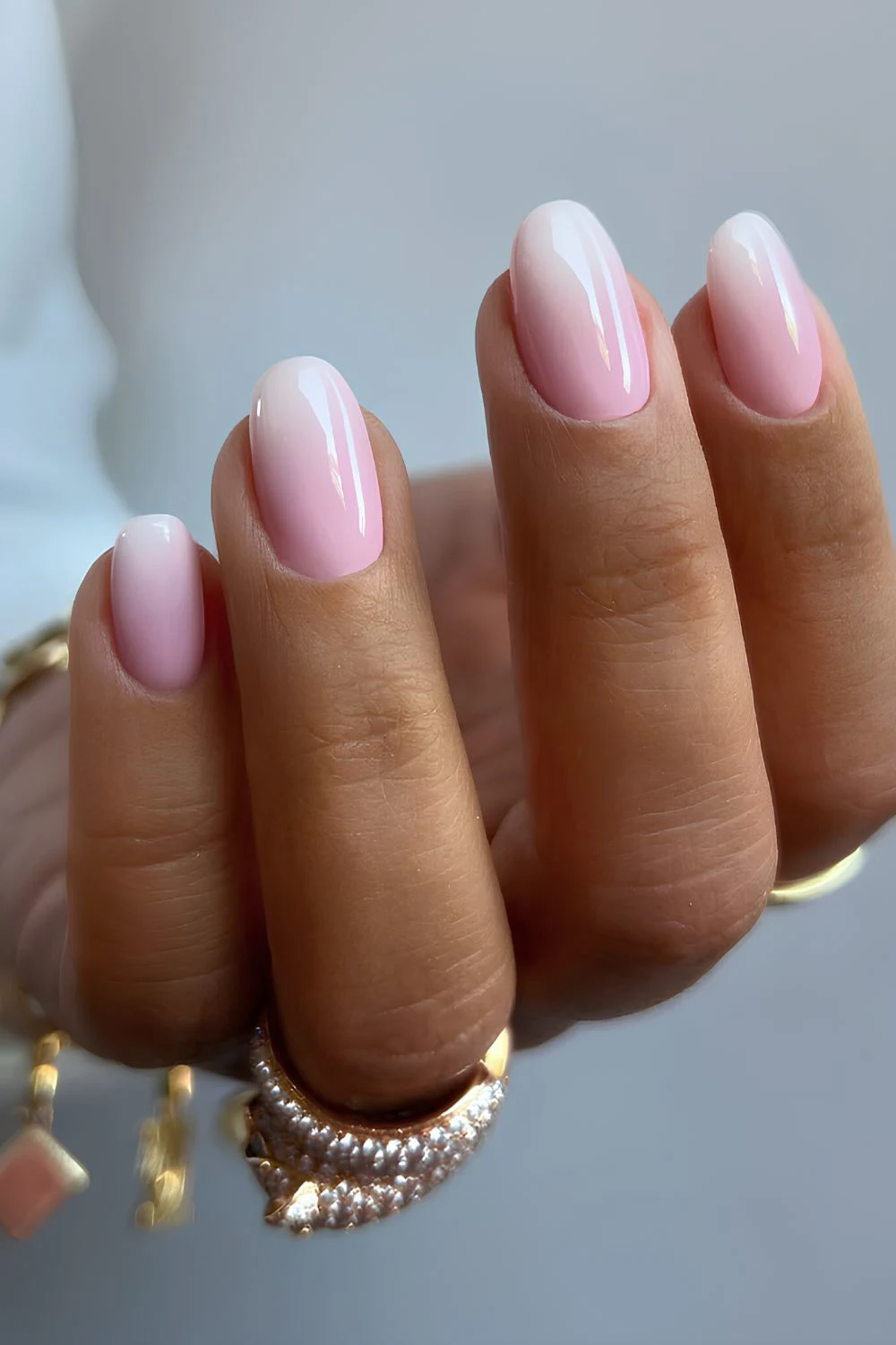White to pastel pink ombre nails