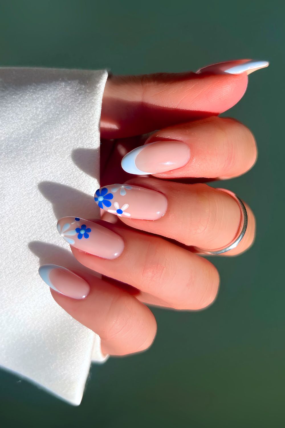 Baby blue French mani with floral art
