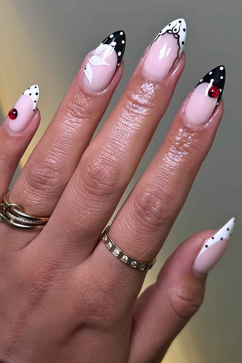 Black and white ladybug manicure