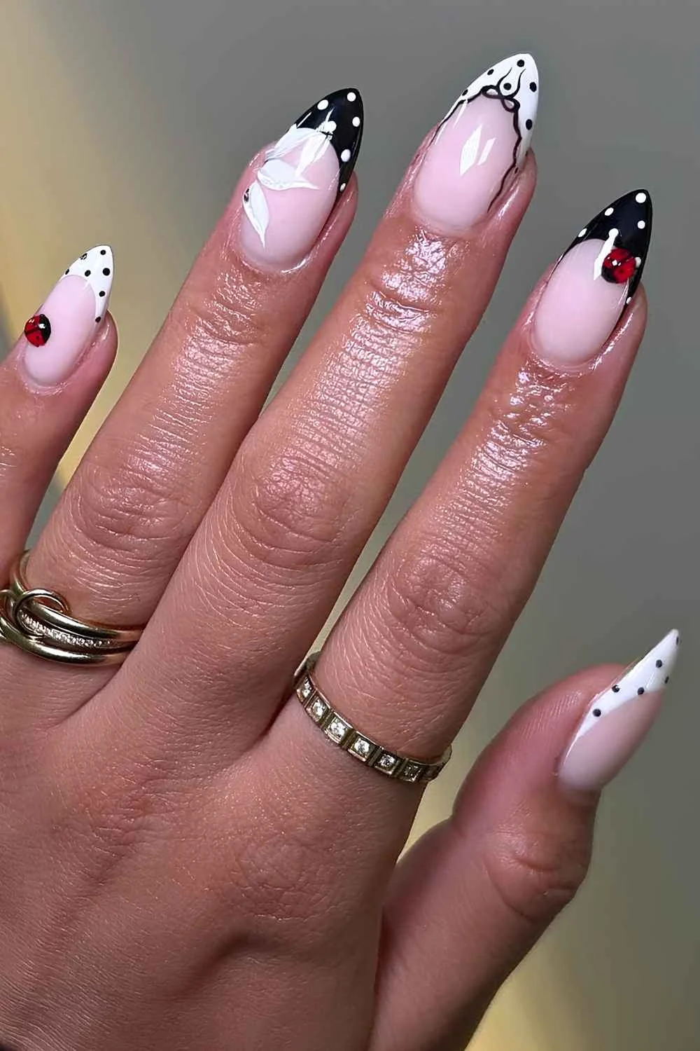 Black and white ladybug manicure