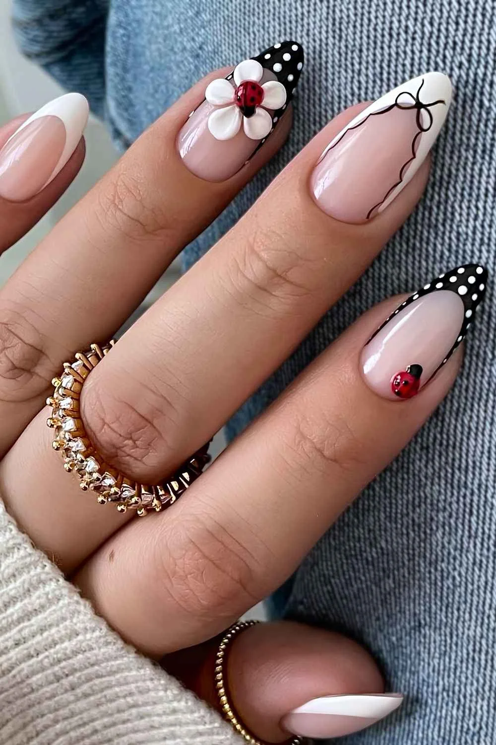 Black and white nails with ladybugs and flowers