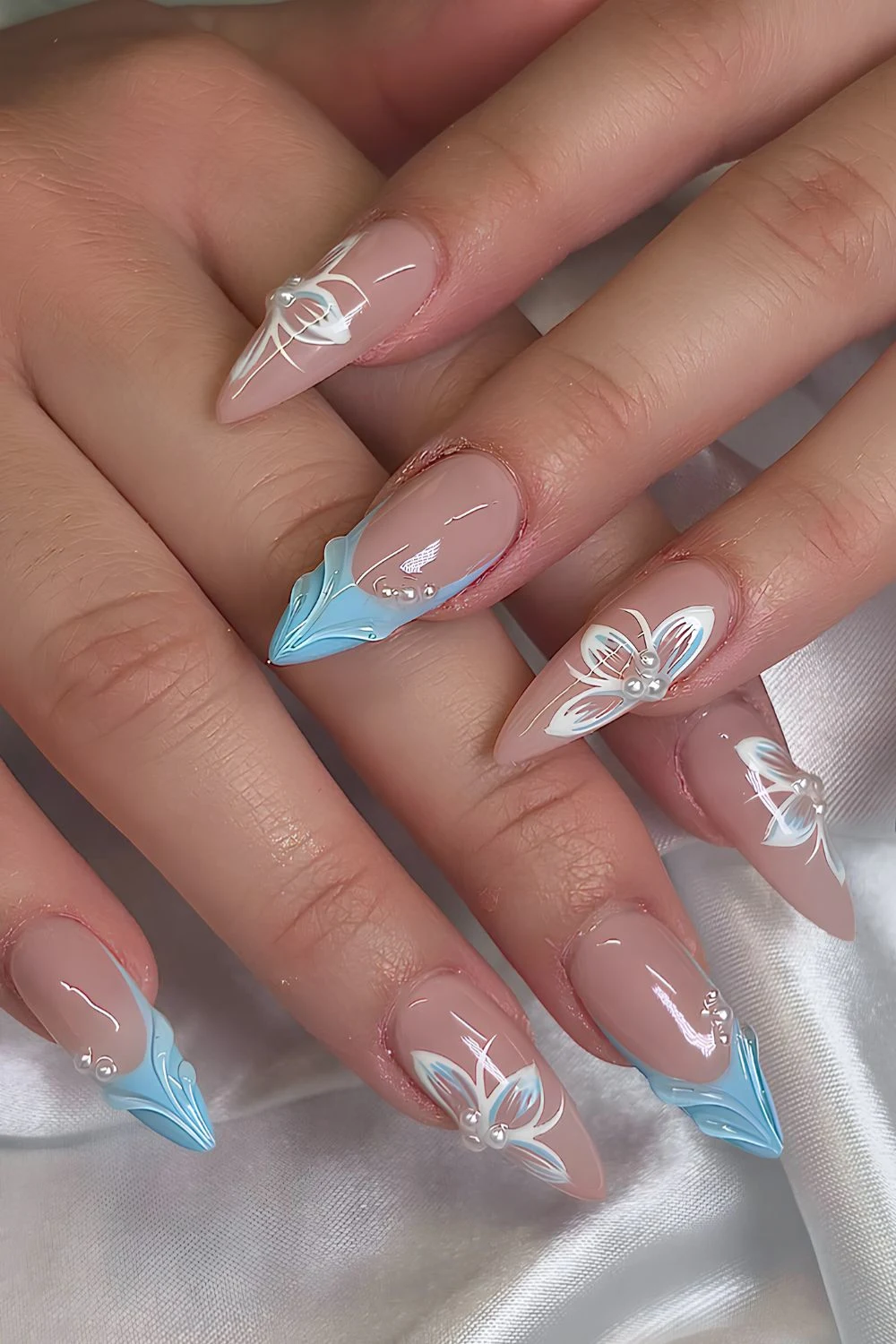 Blue French mani with pearls and flowers