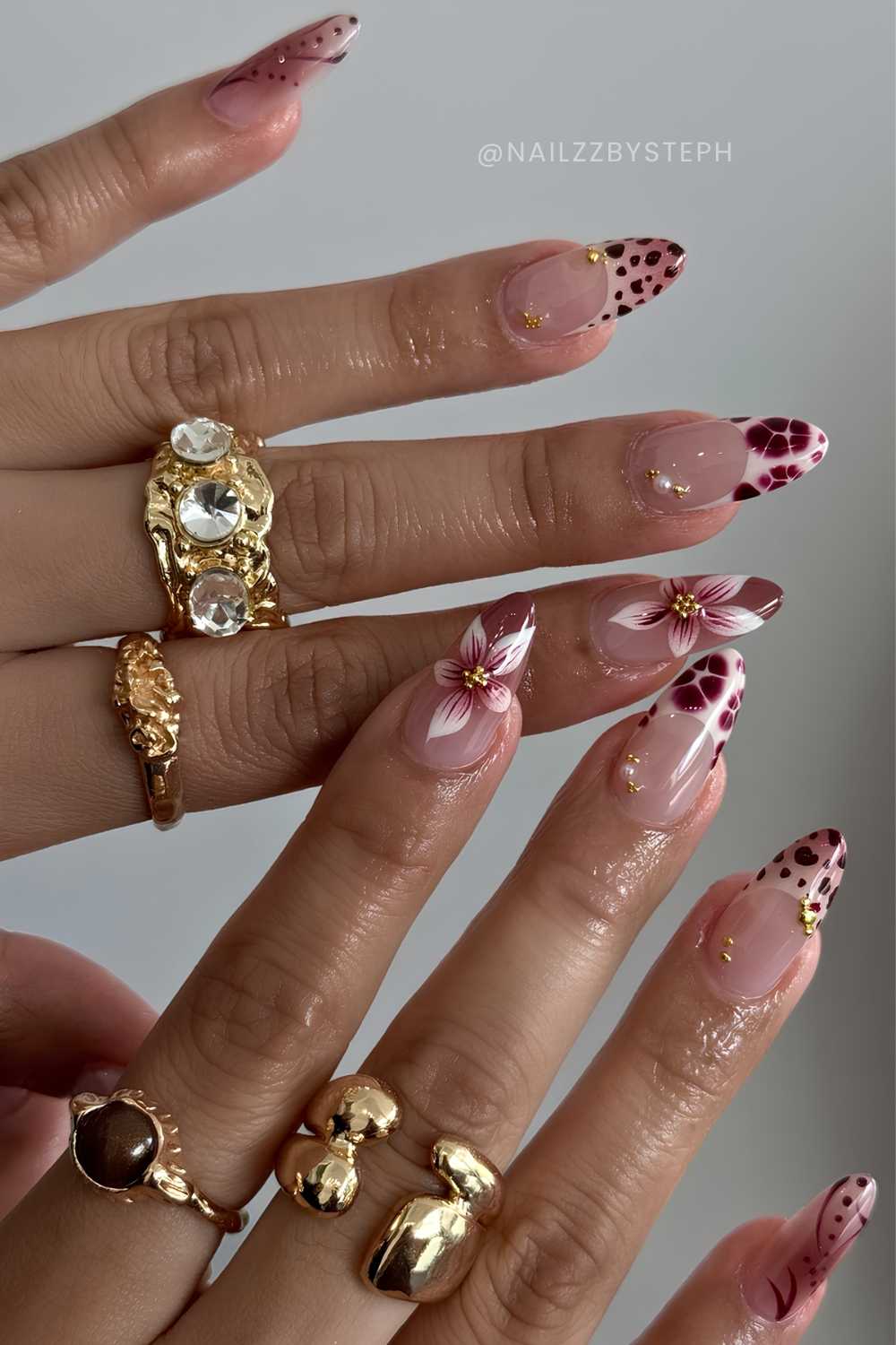 Brown and beige French nails with flowers and animal print