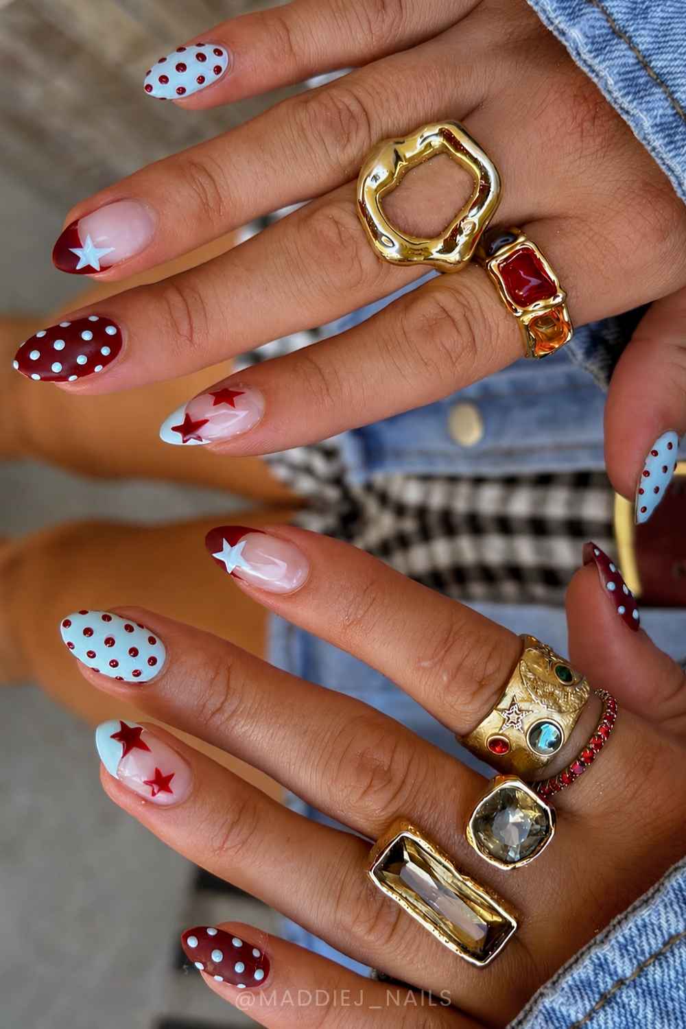 Burgundy and blue nails with stars and polka dots