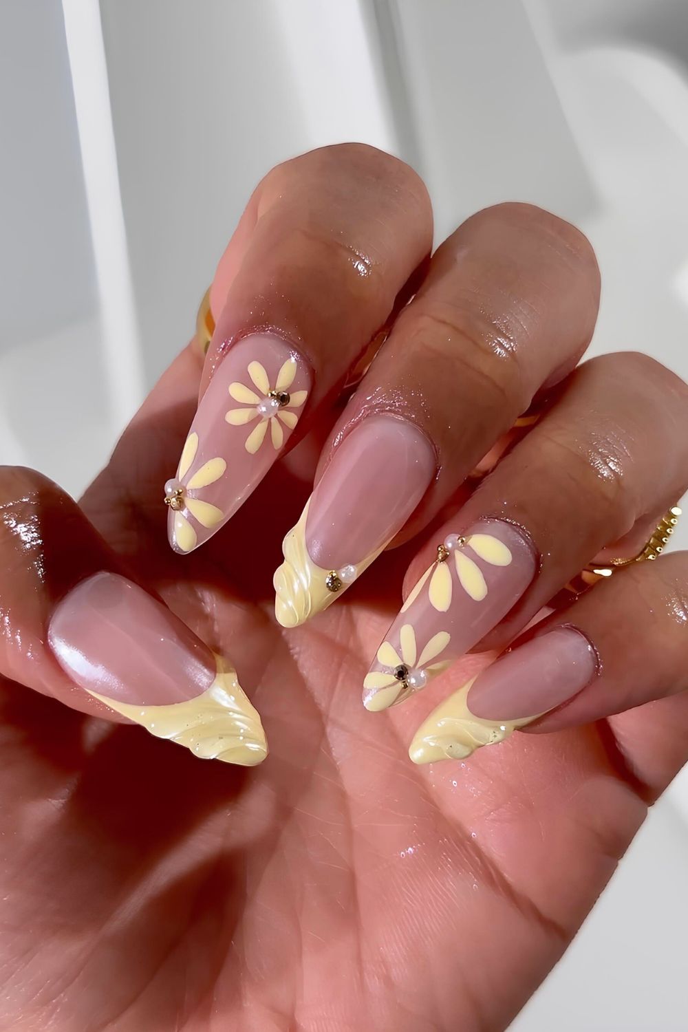 Butter yellow textured French mani with florals and pearls