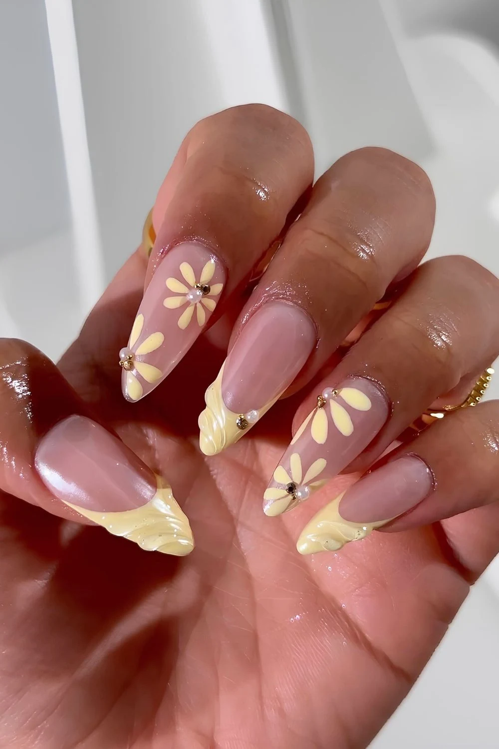 Butter yellow textured French mani with florals and pearls