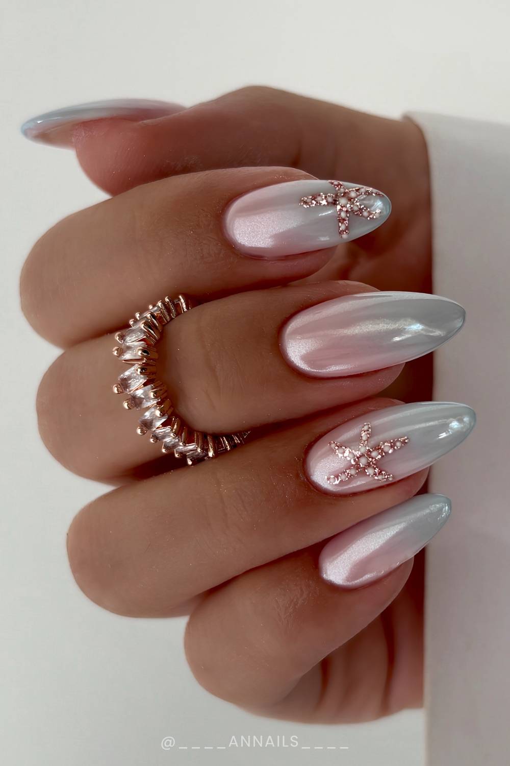 Chrome blue ombre nails with starfish art
