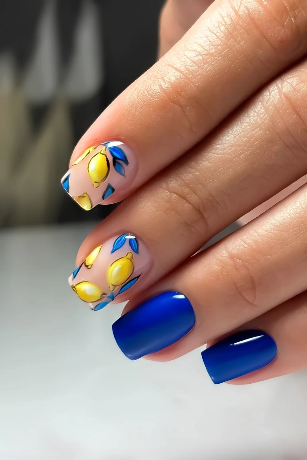 Cobalt blue nails with lemon accents
