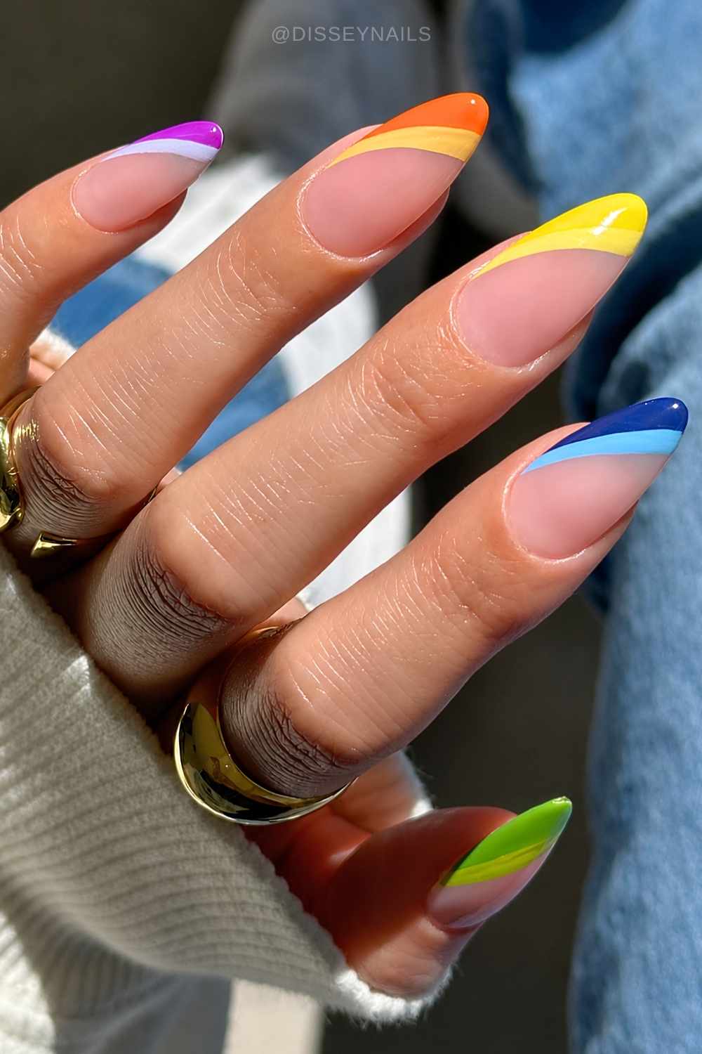 Colorful diagonal pride French mani