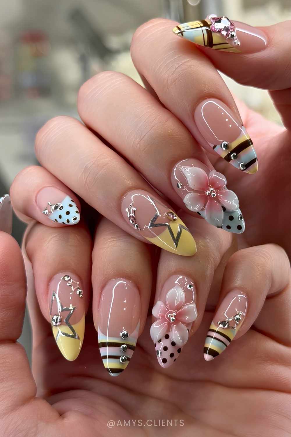 Colorful summer nails with mixed patterns and 3d elements