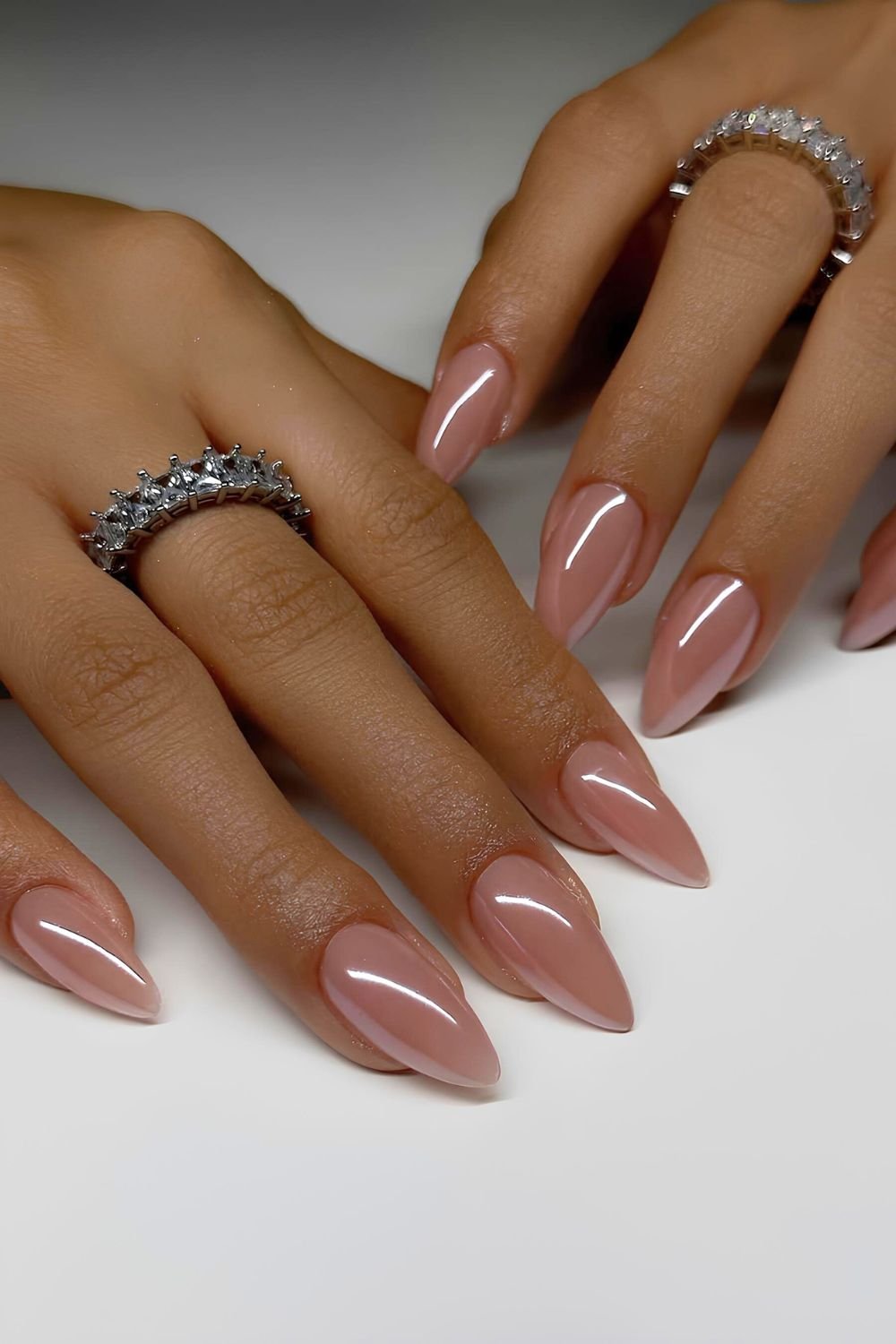Glazed milky pink almond nails