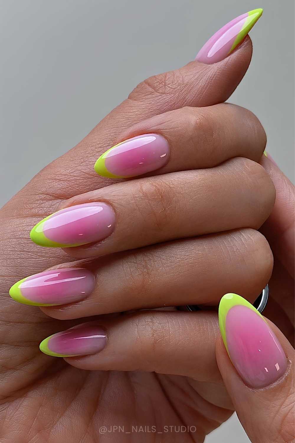 Green French tip mani on pink aura base