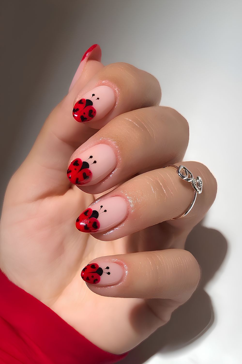 Ladybug French tip nails