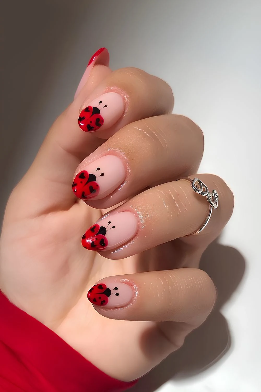 Ladybug French tip nails