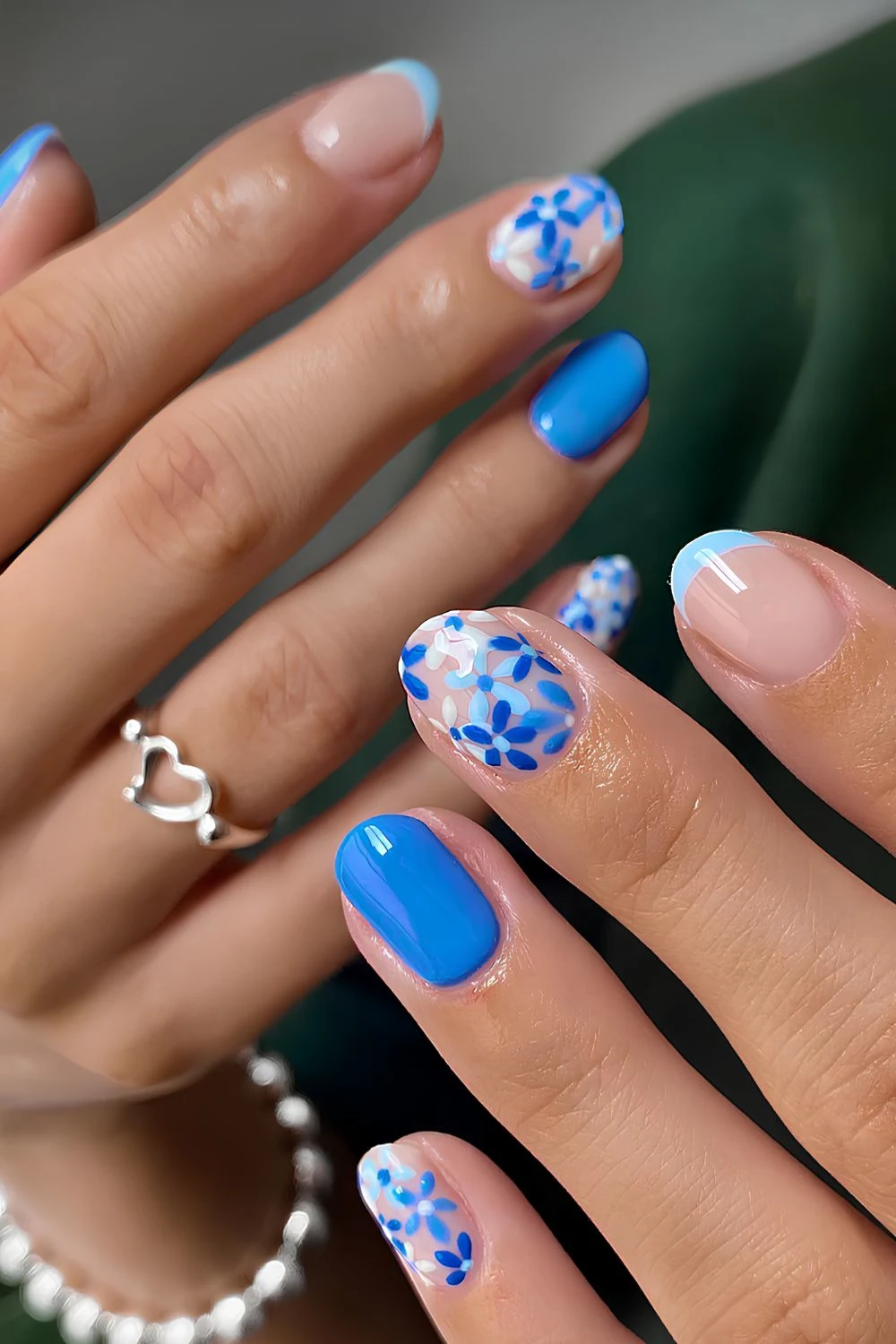 Light and mid-blue floral nails